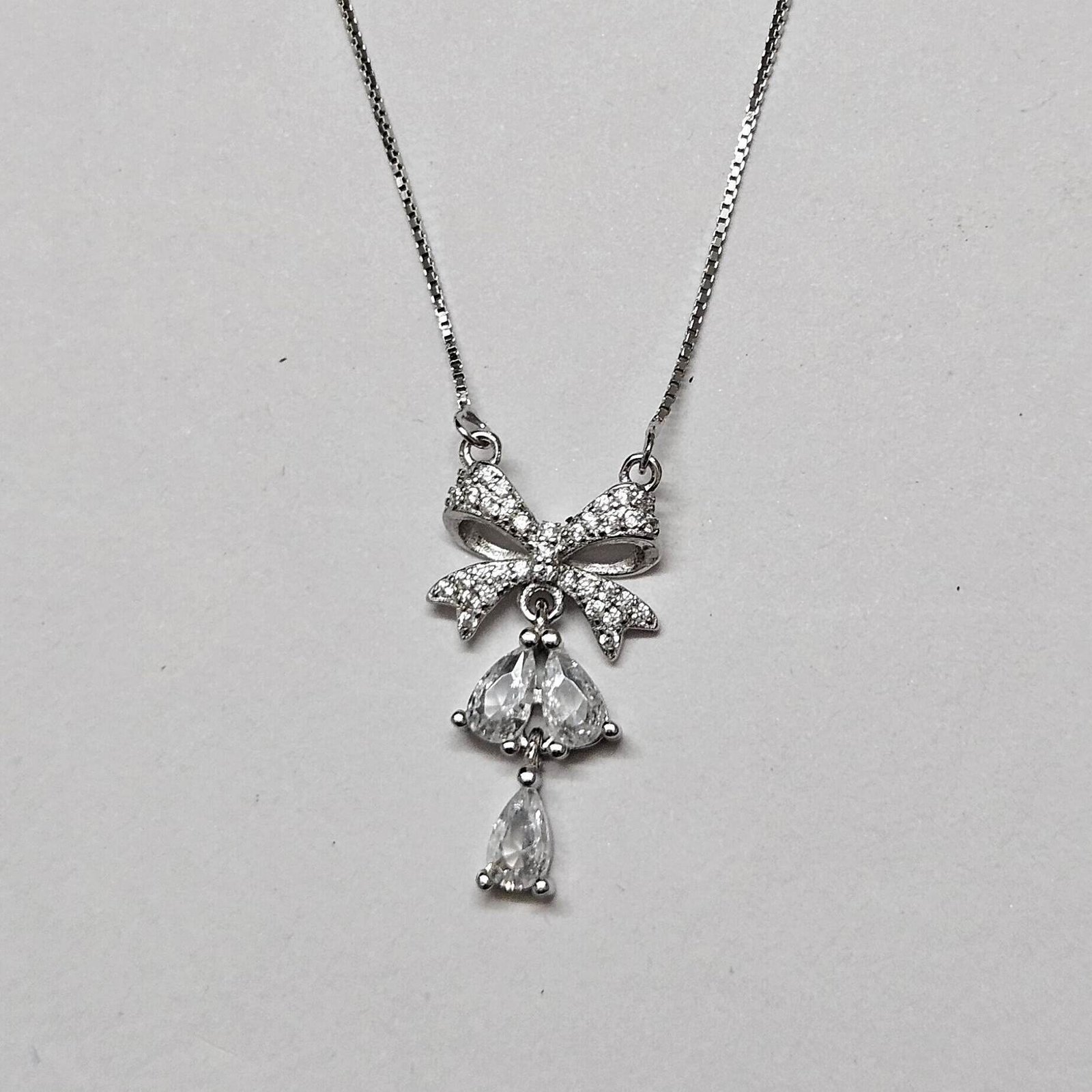 Bow Drop Sparkle Silver Pendant Necklace - Image 2